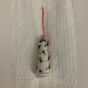 Festive Lighthouse Tree Ornament with Colorful Lights